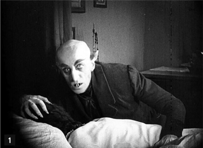 12496_2026_775_Fig1_HTML Rattenkop met puntige snijtanden: graaf Orlok in de eerste Draculaverfilming (1922).